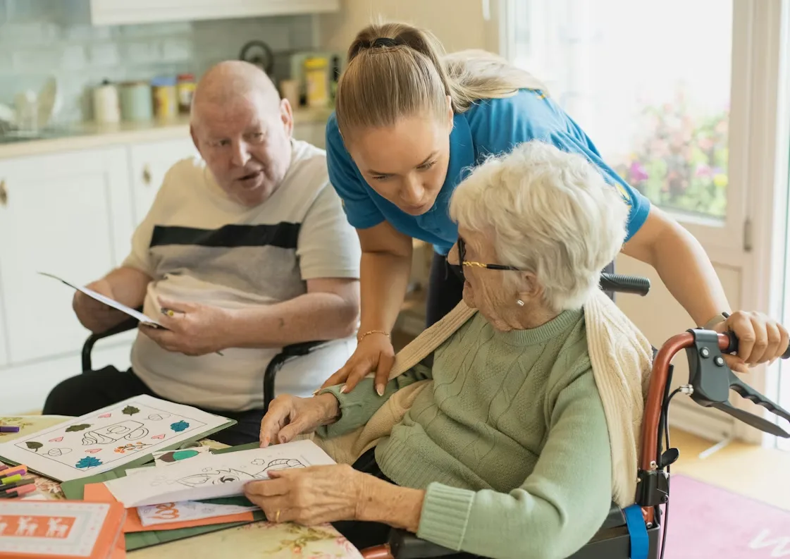 An All Things Carers team member with a client